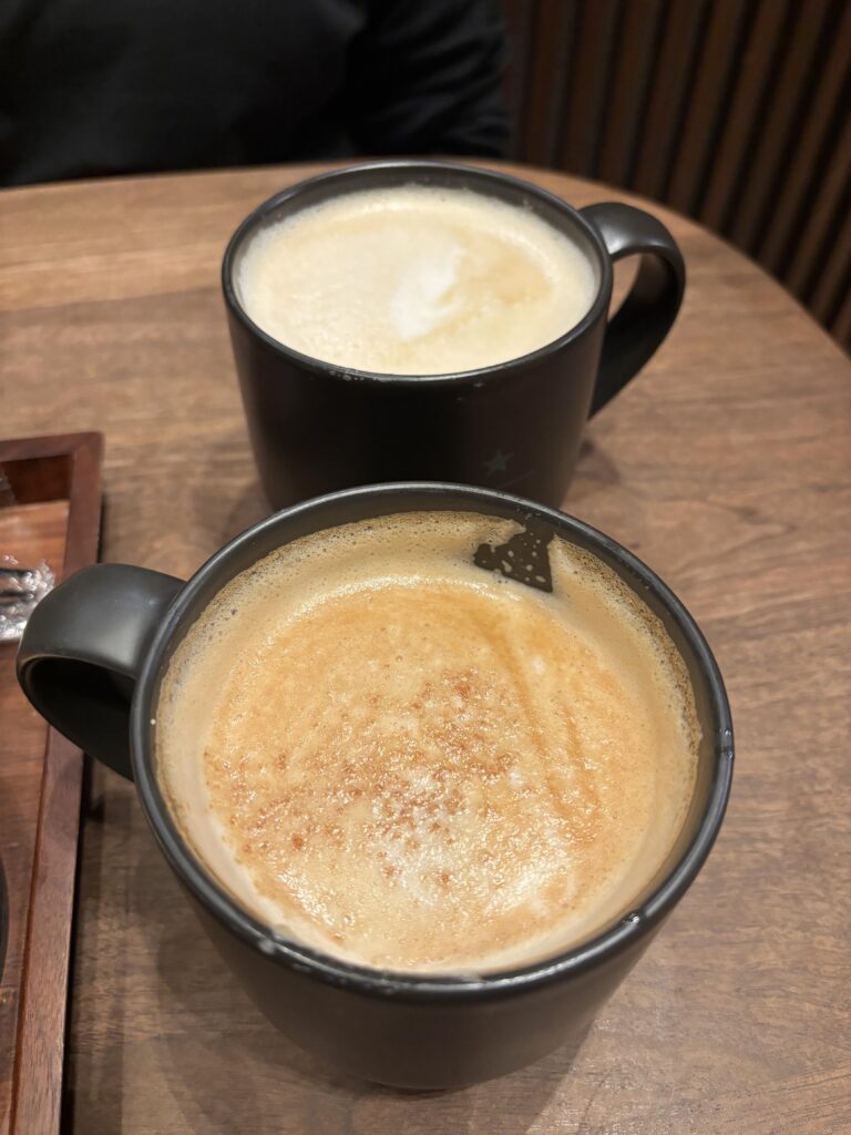 Two coffee cups on a table