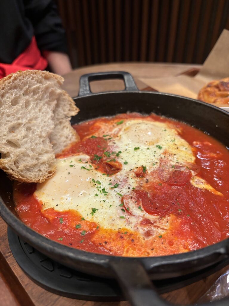 Eggs in Purgatory dish on a table