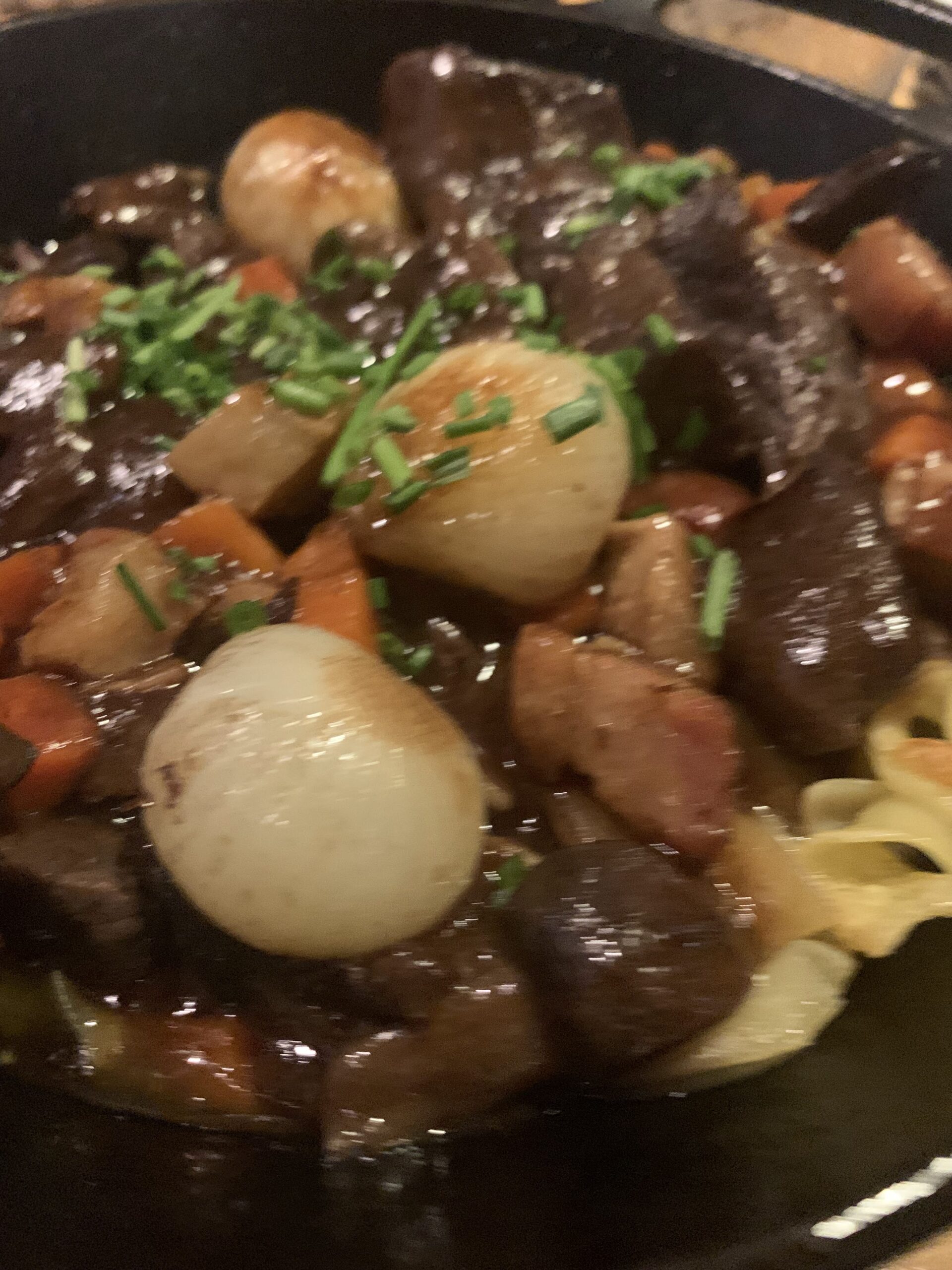 An unclose picture of beef bourgninon