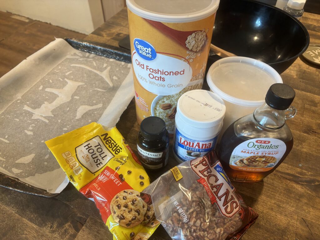 Ingredients for maple pecan granola on a table