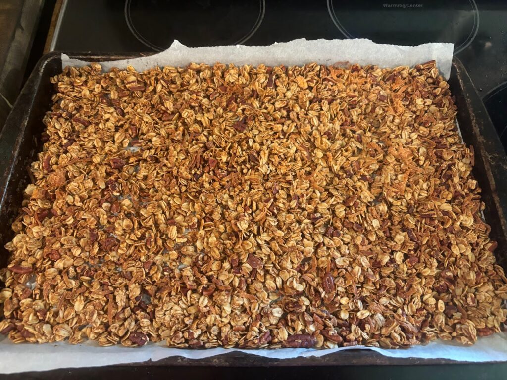 Baked granola on cookie sheet