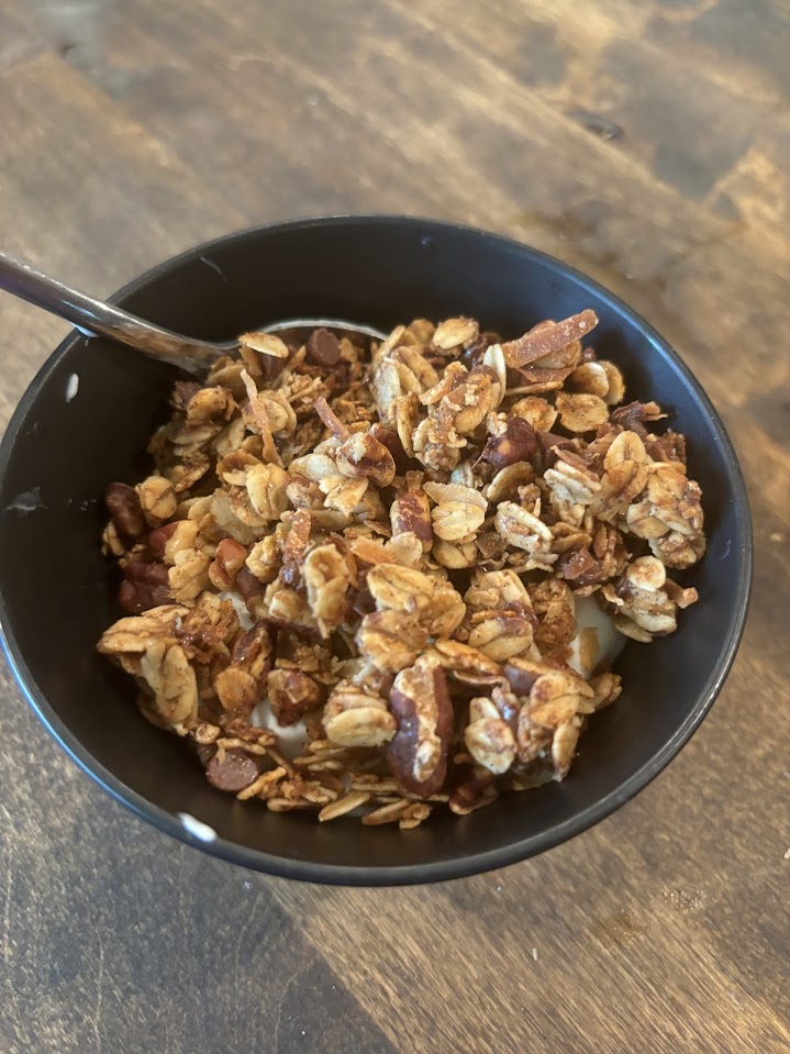 Granola sitting on top of yogurt