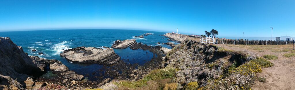 A long picture with a Lighthouse in the right corner