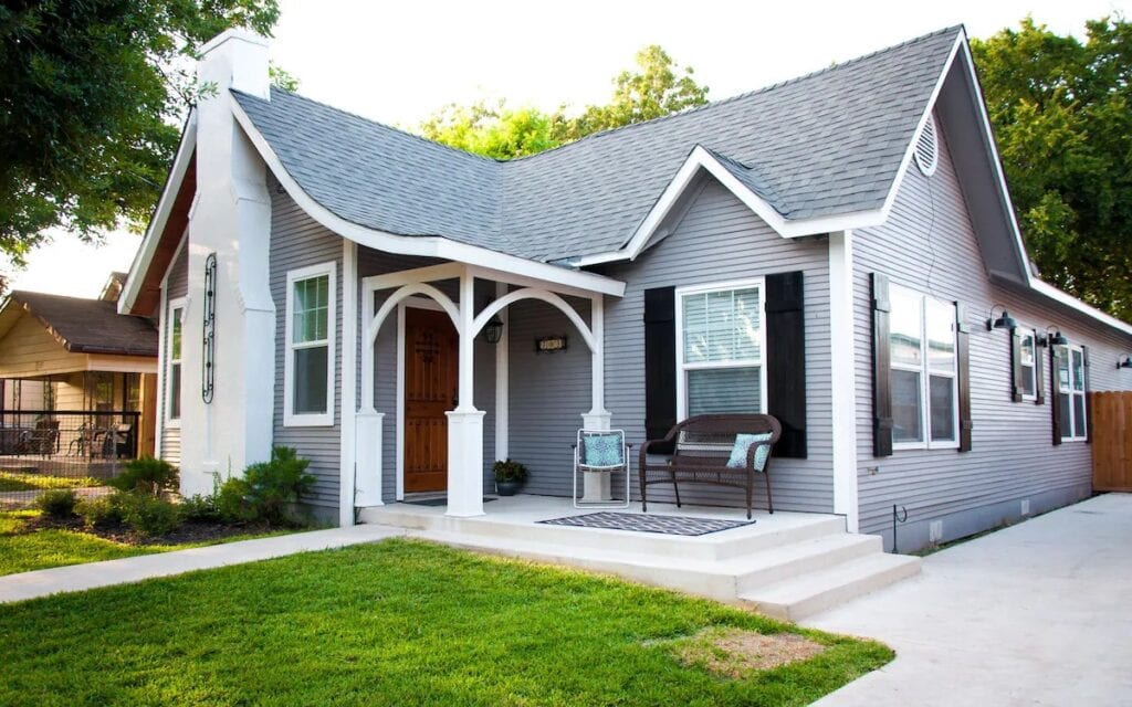 A grey hours with a pitched roof