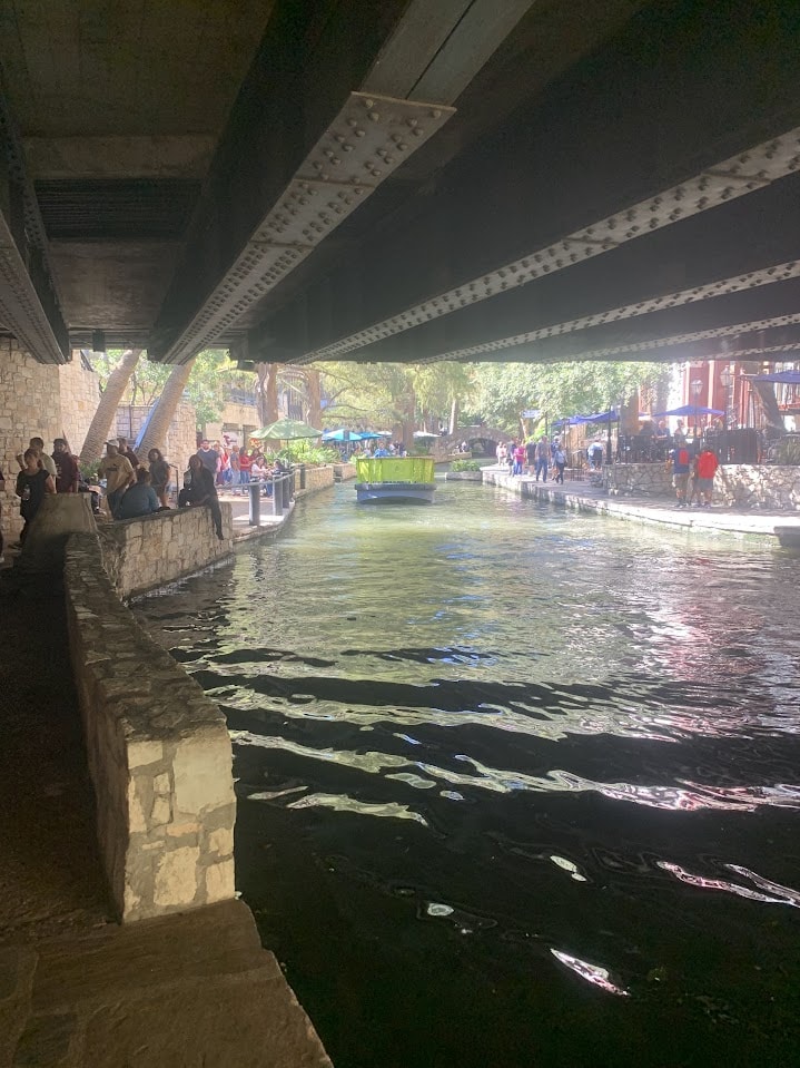 A picture from underneath a bridge at the San Antonio Rierwalk