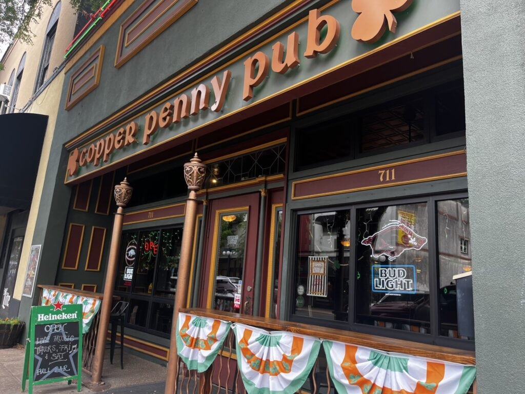 Penny's pub outdoor sign with window