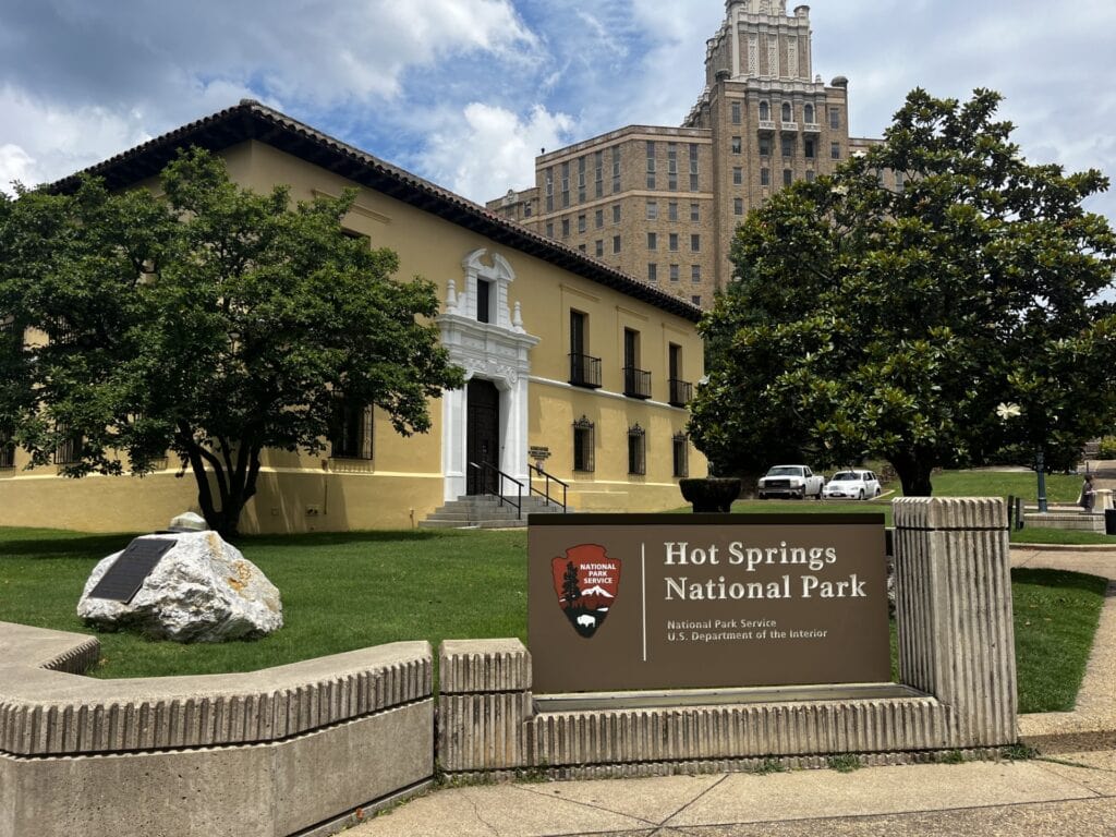 Hot springs national park sign with arlington hotel in the background