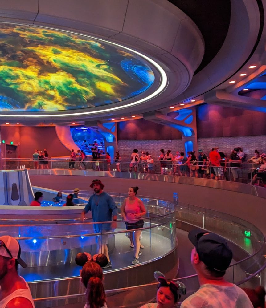 The indoor area of the Cosmic Rewind ride with a cool swirly roof