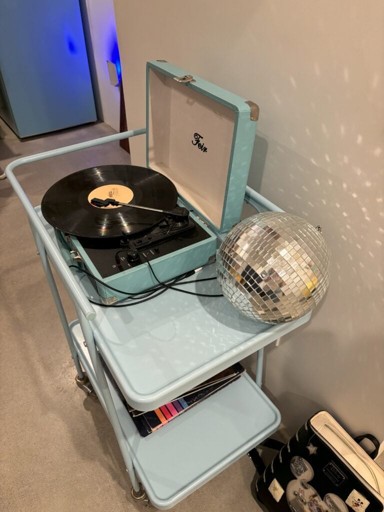 A record player with a disco ball