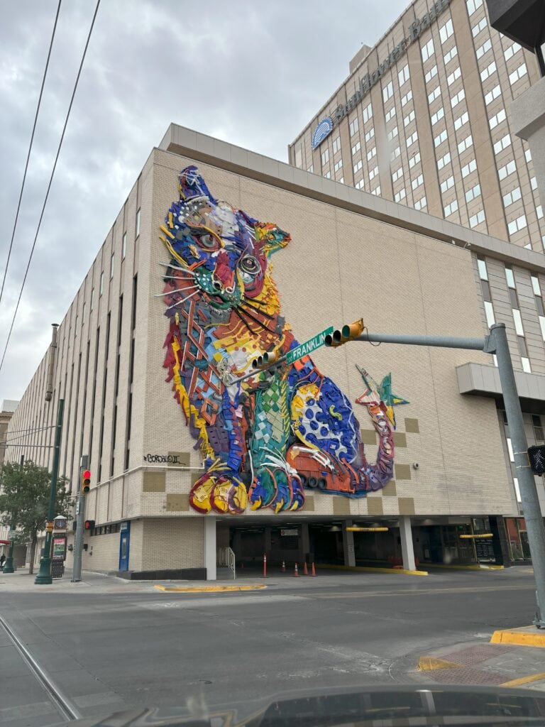 A mural of a fox that is very colorful