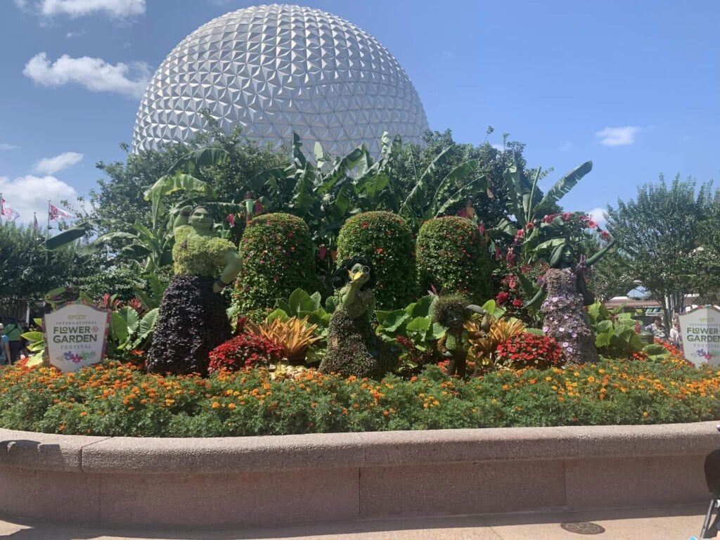 Spaceship Earth with plants in front of it