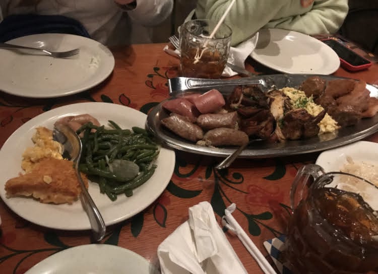 Several plates with food on them from the Germany Pavilion in Epcot