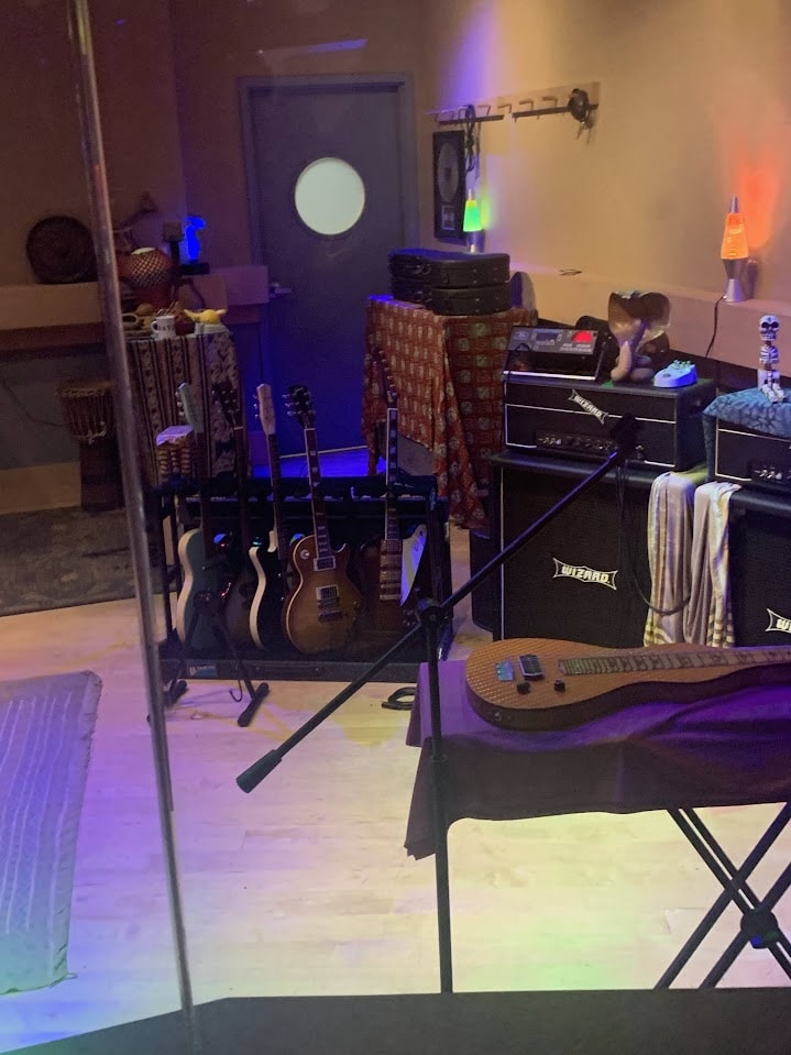 A music room at Rockin' Rollercoaster, complete with guitars