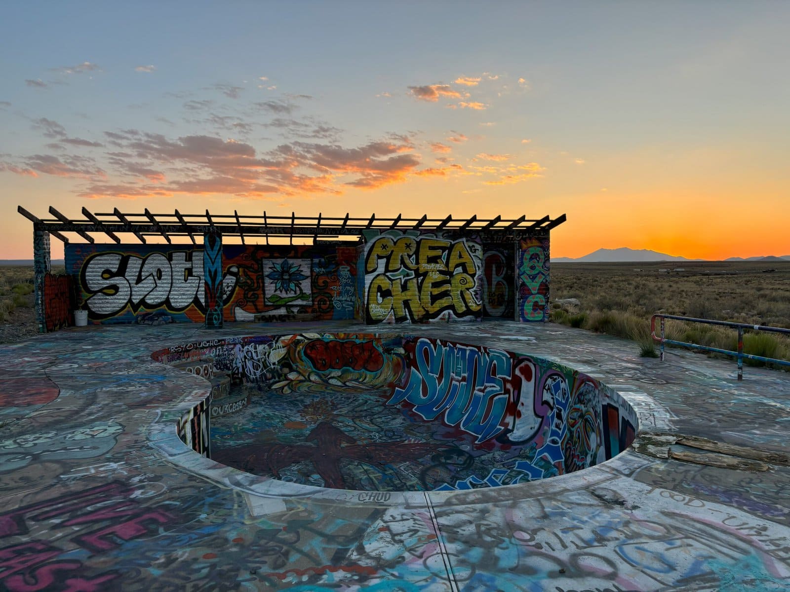 The sun setting on Two Guns, Arizona as a part of our Los Angeles to Dallas Road Trip